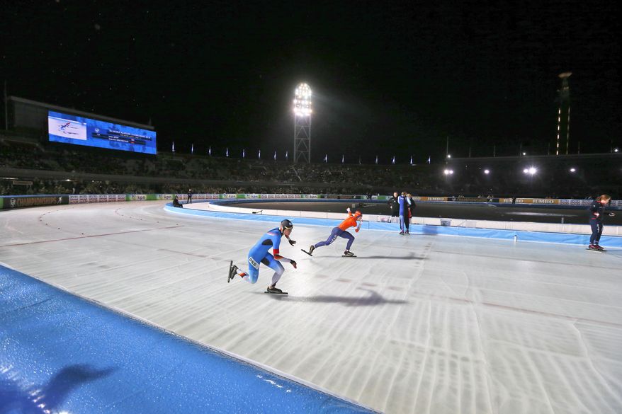 Gabriele Hirschbichler of Germany, left, and Ireen Wust of The Netherlands compete during the women's 500 meters race at the World Championships Speedskating Allround in the Olympic stadium in Amsterdam, Netherlands, Friday, March 9, 2018. (AP Photo/Peter Dejong)