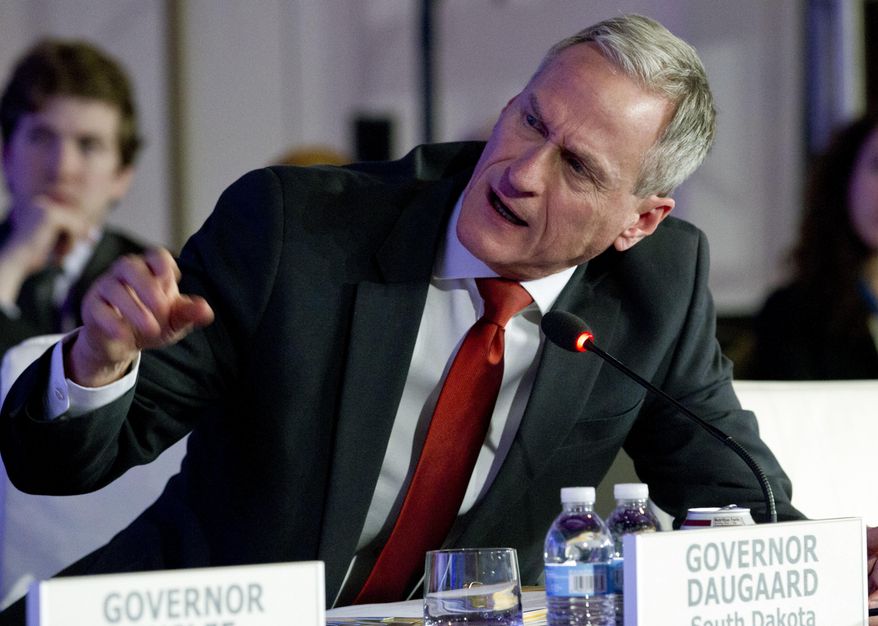 FILE - In this Feb. 25, 2018 file photo, South Dakota Gov. Dennis Daugaard speaks at the panel Pathways to Prosperity during the National Governor Association 2018 winter meeting in Washington. South Dakota lawmakers have left the Capitol after eking out raises for teachers, state workers and Medicaid providers in the state budget. The funding hikes that lawmakers passed Friday, March 9 seemed unattainable when the Legislature started work in January. The small windfall closes a session tinged with lingering Republican frustration over ballot questions voters approved in 2016. (AP Photo/Jose Luis Magana)