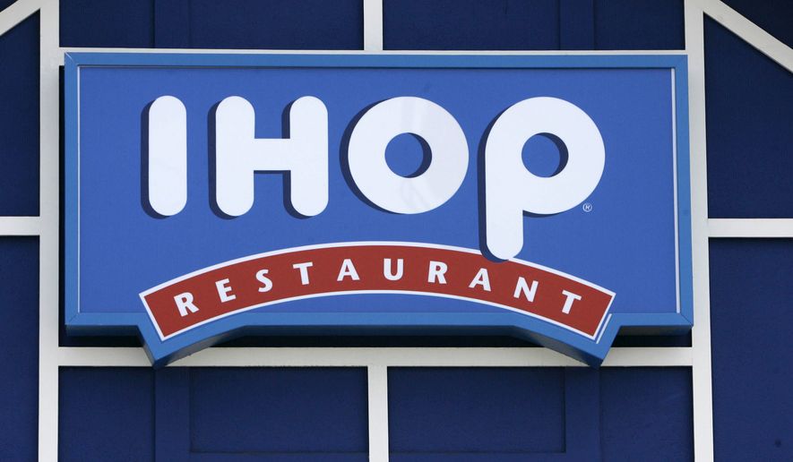 In this July 16, 2007, file photo, an IHOP restaurant sign is shown in Burbank, Calif. (AP Photo/Nick Ut, File)