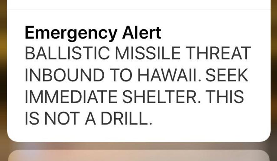 FILE - This Jan. 13, 2018 file smartphone screen capture shows a false incoming ballistic missile emergency alert sent from the Hawaii Emergency Management Agency system. Hawaii officials have repeatedly pointed to a low-level state employee and a breakdown in his agency’s leadership as the main cause for a missile alert that left hundreds of thousands of islanders thinking they might die in a nuclear blast in January. But efforts to find out more about what other top officials did that day have been stymied at the highest levels of state government.  (AP Photo/Caleb Jones, file)