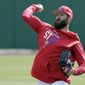 Philadelphia Phillies pitcher Jake Arrieta throws during a work out before a spring baseball exhibition game against the Tampa Bay Rays, Tuesday, March 13, 2018, in Clearwater, Fla. (AP Photo/John Raoux)