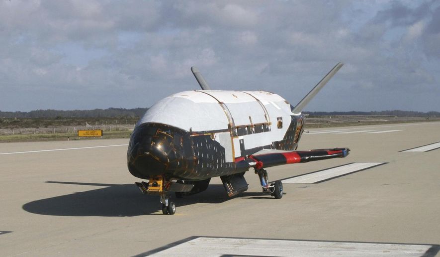 This June 2009 photo provided by the U.S. Air Force via NASA shows the X-37B Orbital Test Vehicle at Vandenberg Air Force Base, Calif. President Donald Trump says there may someday be a &amp;quot;space force&amp;quot; fighting alongside the Air Force, Army and other branches of the military. Trump was speaking March 13, 2018, about his administration&#x27;s investments in space exploration to members of the military when he said that space is becoming a &amp;quot;war-fighting domain.&amp;quot;  (U.S. Air Force via AP)