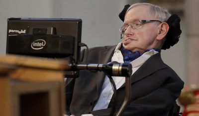 Britain&#39;s Professor Stephen Hawking receives the Honorary Freedom of the City of London during a ceremony at the Guildhall in the City of London. Cambridge University has put Stephen Hawking&#39;s doctoral thesis online on Monday, Oct. 23, 2017, triggering such interest that it crashed the university&#39;s website. Completed in 1966 when Hawking was 24, &quot;Properties of Expanding Universes&quot; explores ideas about the origins of the universe that have resonated through the scientists career. (AP Photo/Matt Dunham, file)