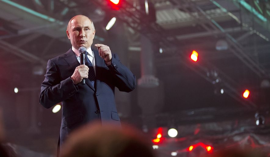 Russian President Vladimir Putin gestures while speaking at a youth forum &quot;Russia, Land of Opportunity&quot; in Moscow, Russia, Thursday, March 15, 2018. (AP Photo/Alexander Zemlianichenko, pool)