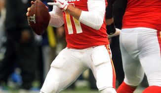 File-This jan. 28, 2018, file photo shows AFC quarterback Alex Smith (11), of the Kansas City Chiefs, looking to pass, during the first half of the NFL Pro Bowl football game against the NFC, in Orlando, Fla. The Alex Smith era has begun in Washington as the Redskins completed their trade for the veteran quarterback. Smith joined the Redskins from the Kansas City Chiefs in exchange for a third-round pick and cornerback Kendall Fuller. The deal and Smith’s subsequent four-year contract extension were agreed to in February but couldn’t become official until 4 p.m. EDT Wednesday, March 14, 2018, the start of the new league year. (AP Photo/Steve Nesius, File)