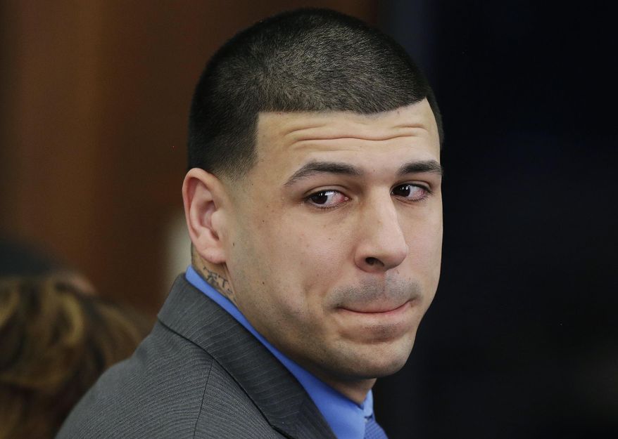 FILE - In this April 14, 2017, file pool photo, former New England Patriots tight end Aaron Hernandez turns to look in the direction of the jury as he reacts to his acquittal for the murder in the 2012 deaths of Daniel de Abreu and Safiro Furtado, at Suffolk Superior Court in Boston. Hernandez&#x27;s murder conviction for the previous killing of Odin Lloyd was dismissed after Hernandez was found hanging in his cell several days later. The Massachusetts Supreme Judicial Court recently announced it will take up Hernandez&#x27;s case and examine the legal principle under which  courts typically erase convictions of defendants who die before their direct appeals can be heard. (AP Photo/Stephan Savoia, Pool) ** FILE **