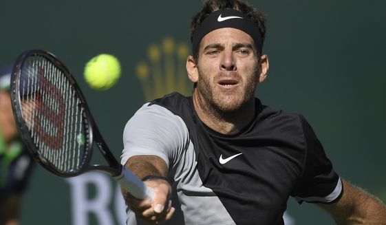Juan Martin del Potro, of Argentina, returns a shot against Philipp Kohlschreiber, of Germany, during the quarterfinals at the BNP Paribas Open tennis tournament, Friday, March 16, 2018, in Indian Wells, Calif. (AP Photo/Mark J. Terrill)