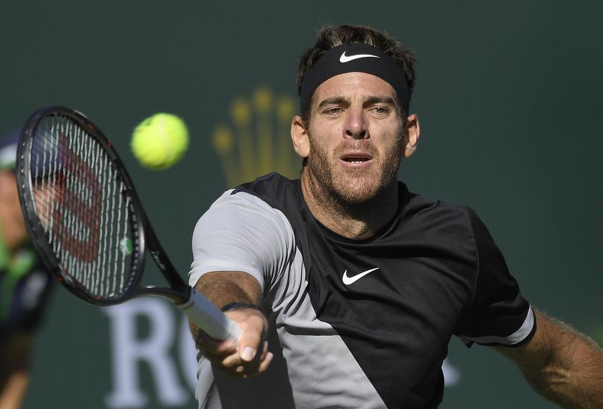 Juan Martin del Potro, of Argentina, returns a shot against Philipp Kohlschreiber, of Germany, during the quarterfinals at the BNP Paribas Open tennis tournament, Friday, March 16, 2018, in Indian Wells, Calif. (AP Photo/Mark J. Terrill)
