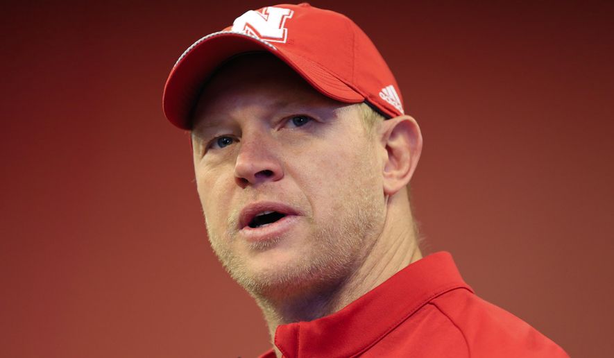 Nebraska NCAA college football head coach Scott Frost answers questions during a news conference in Lincoln, Neb., Wednesday, March 14, 2018. The biggest question Frost faces as he enters spring practice: Who'll play quarterback? Patrick O'Brien, Tristan Gebbia and incoming freshman Adrian Martinez all are being given an equal chance to win the job. (AP Photo/Nati Harnik)
