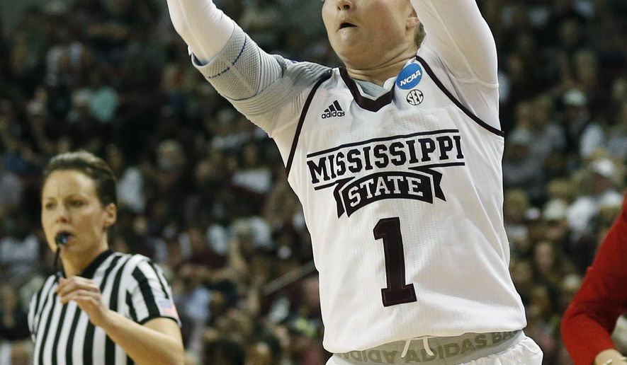 Mississippi State guard Blair Schaefer (1) shoots a three-point basket against Nicholls during the first half of a first-round game in the NCAA women&#39;s college basketball tournament in Starkville, Miss., Saturday, March 17, 2018. (AP Photo/Rogelio V. Solis)