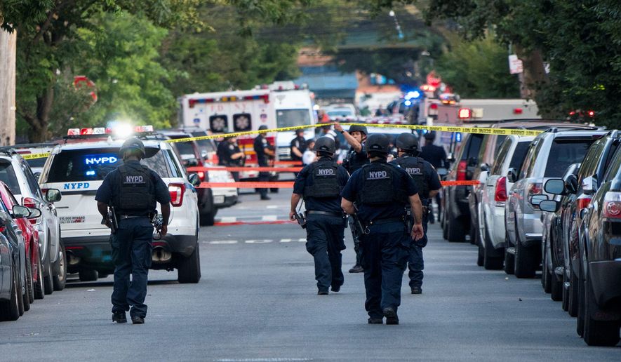 The notion that more police equals less crime grew out of the successful strategies in New York in the 1990s that shifted the emphasis from solving crimes to deterrence. (Associated Press/File)