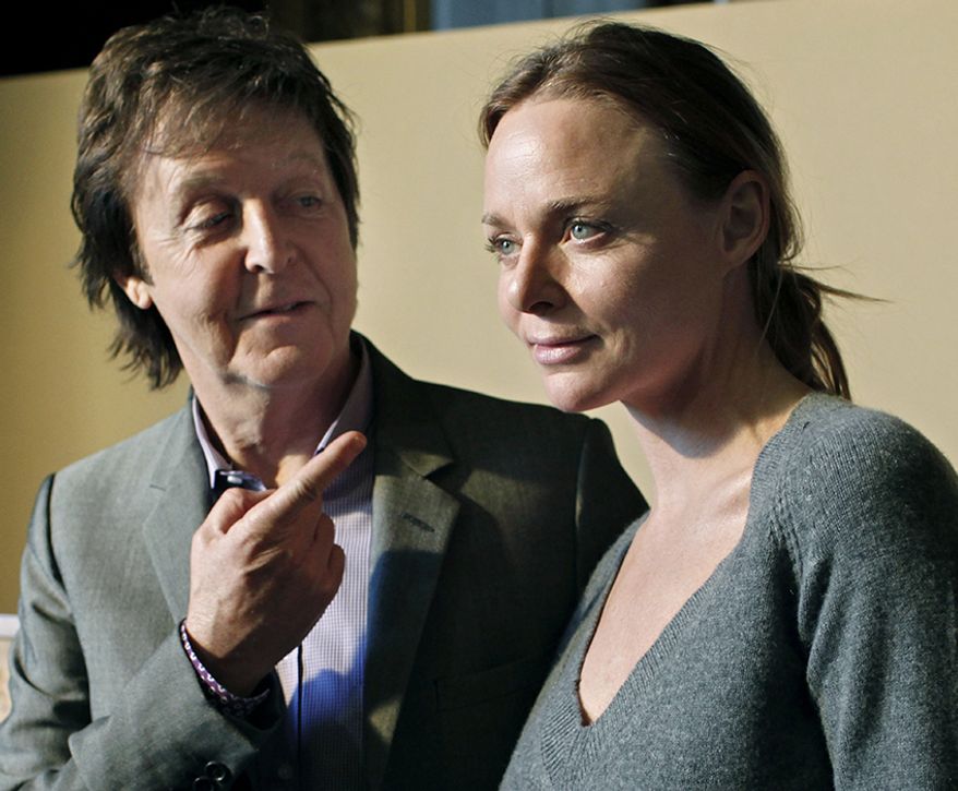 Paul McCartney and his daughter Stella McCartney. 
Stella McCartney, Fashion Designer. 
Paul McCartney singer-songwriter, multi-instrumentalist, and composer. Bass guitarist and singer for the Beatles  (AP Photo/Thibault Camus)