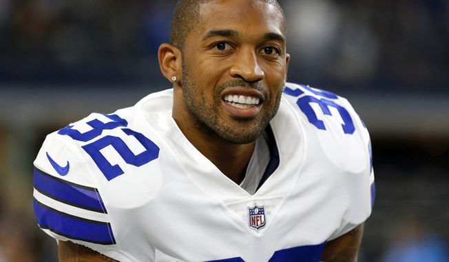 FILE - In this Aug. 27, 2017, file photo, Dallas Cowboys cornerback Orlando Scandrick (32) stands on the sideline during a preseason NFL football game against the Oakland Raiders, in Arlington, Texas. A person with direct knowledge of the move says the Washington Redskins have signed cornerback Orlando Scandrick to a two-year deal worth up to $10 million. The person spoke to The Associated Press on condition of anonymity Monday, March 19, 2018, because the team had not announced the deal.(AP Photo/Roger Steinman, File)