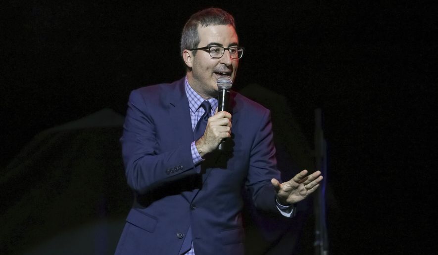 FILE - In this Nov. 7, 2017 file photo, comedian John Oliver performs at the 11th Annual Stand Up for Heroes benefit in New York. Oliver has trolled his way to the top. The HBO host’s spoof of a new picture book by the wife and daughter of Vice President Mike Pence was No. 1 on Amazon.com as of midday Monday, March 19, 2018. (Photo by Brent N. Clarke/Invision/AP, File)