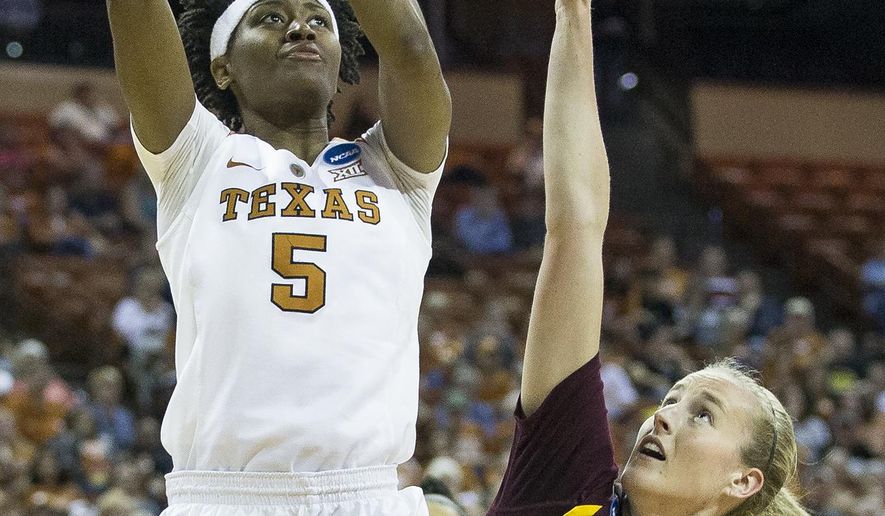 Texas forward Jordan Hosey (5) goes for a layup over Arizona State guard Courtney Ekmark (22) during a second-round game in the NCAA women&#39;s college basketball tournament in Austin, Texas, Monday, March 19, 2018. (Nick Wagner/Austin American-Statesman via AP)