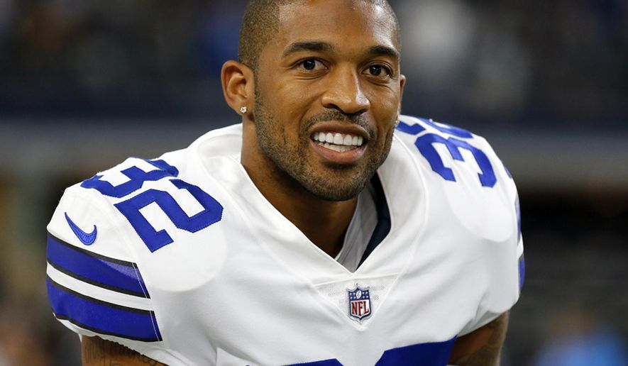 FILE - In this Aug. 27, 2017, file photo, Dallas Cowboys cornerback Orlando Scandrick (32) stands on the sideline during a preseason NFL football game against the Oakland Raiders, in Arlington, Texas. A person with direct knowledge of the move says the Washington Redskins have signed cornerback Orlando Scandrick to a two-year deal worth up to $10 million. The person spoke to The Associated Press on condition of anonymity Monday, March 19, 2018, because the team had not announced the deal.(AP Photo/Roger Steinman, File)