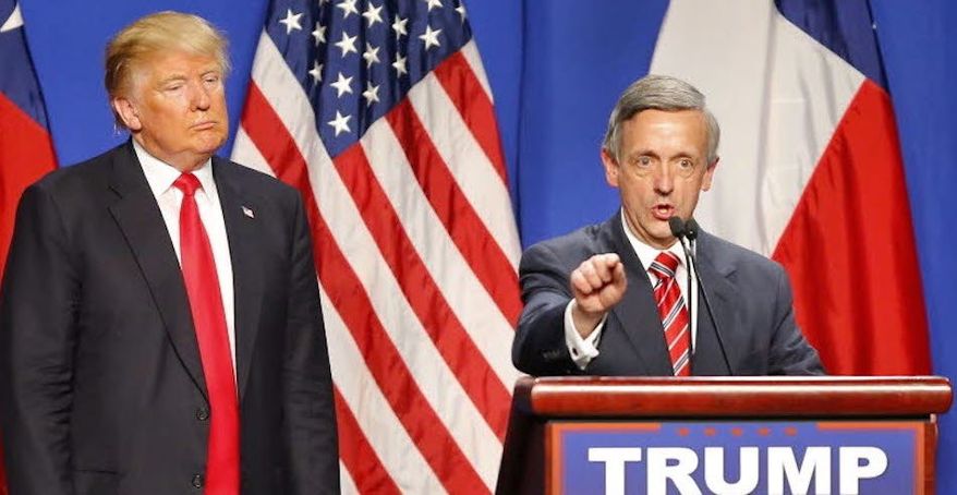 Pastor Robert Jeffress appears with then-candidate Donald Trump at a presidential event in this file photo. President Trump said on April 10, 2020, that he would watch Mr. Jeffress&#x27;s livestreamed worship service on Easter Sunday, April 12. (Associated Press) ** FILE **