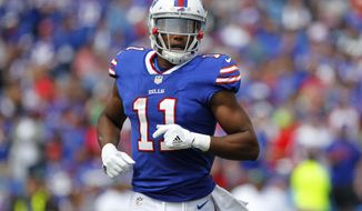 FILE - In this Sept. 10, 2017, file photo, Buffalo Bills&#39; Zay Jones  runs on the field during the first half of the team&#39;s NFL football game against the New York Jets in Orchard Park, N.Y. Jones has been arrested in Los Angeles following a naked, bloody argument with his brother, Vikings receiver Cayleb Jones. A police spokesman says the player, whose legal name is Isaiah Avery Jones, was arrested Monday night, March 19, 2018, after officers responded to a disturbance. (AP Photo/Jeffrey T. Barnes, File)