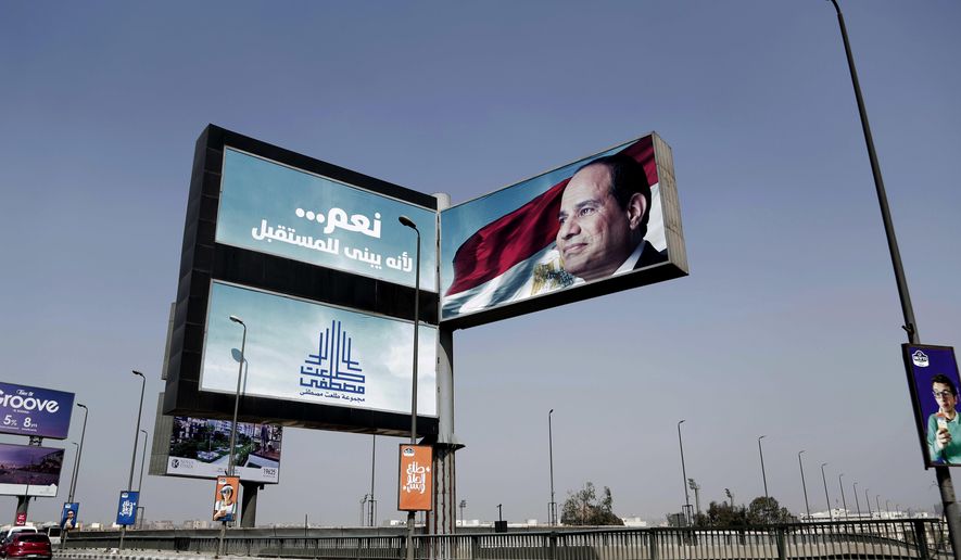 FILE - In this March 14, 2018 file photo, an election campaign banner for Egyptian presidential candidate President Abdel-Fattah el-Sissi, with Arabic that reads, &amp;quot;yes...to build the future,&amp;quot; hangs over a bridge, in Cairo, Egypt. With the March 26-28 election, Egypt breaks with most pretense of democratic process, insisting stability is the priority. The vote saw an unprecedented purge from the race of would-be opponents to President Abdel-Fattah el-Sissi, leaving his only rival a little known politician who is hardly campaigning. (AP Photo/Nariman El-Mofty, File)