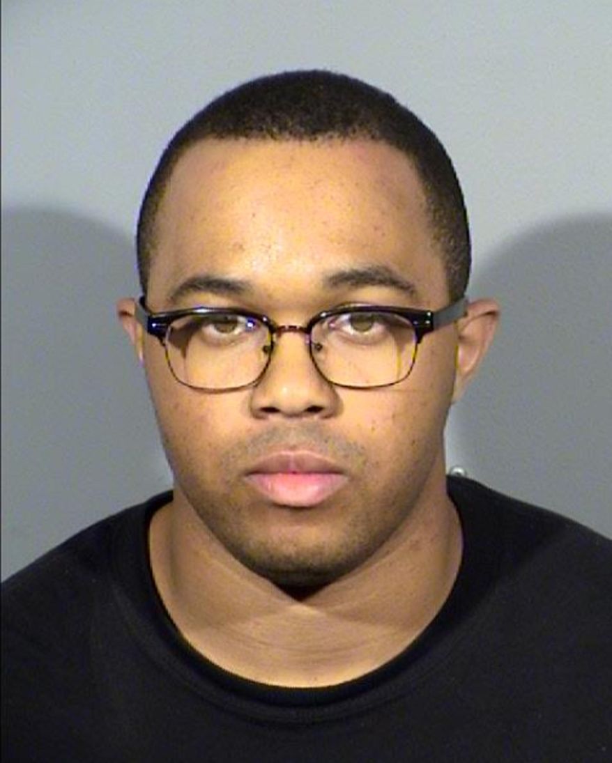 This undated Clark County Detention Center booking photo shows former Nevada state prison guard George McMurry, of Las Vegas. McMurry was sentenced Tuesday, March 20, 2018, in Las Vegas to one-to-four years in state prison following his guilty pleas in November 2017 to felony charges of drug transport and furnishing a controlled substance to a state prisoner. (Clark County Detention Center/Las Vegas Metropolitan Police Department via AP)