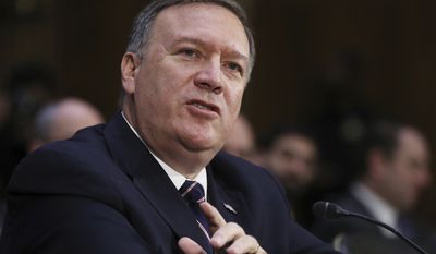 FILE - In this Jan. 12, 2017 file photo, CIA Director-designate Rep. Michael Pompeo, R-Kan. testifies on Capitol Hill in Washington. The Senate is on track to confirm Pompeo to run the CIA and is expected to vote on his nomination Monday, Jan. 23, 2017, evening.  (AP Photo/Manuel Balce Ceneta, File)