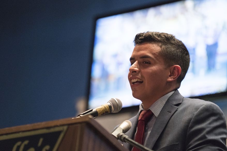 Democratic candidate for Illinois House Aaron Ortiz attends a celebration for Jesus "Chuy" Garcia, after Garcia won the Democratic primary in the 4th Congressional District race, Tuesday, March 20, 2018, in Chicago. (Max Herman/Chicago Sun-Times via AP)