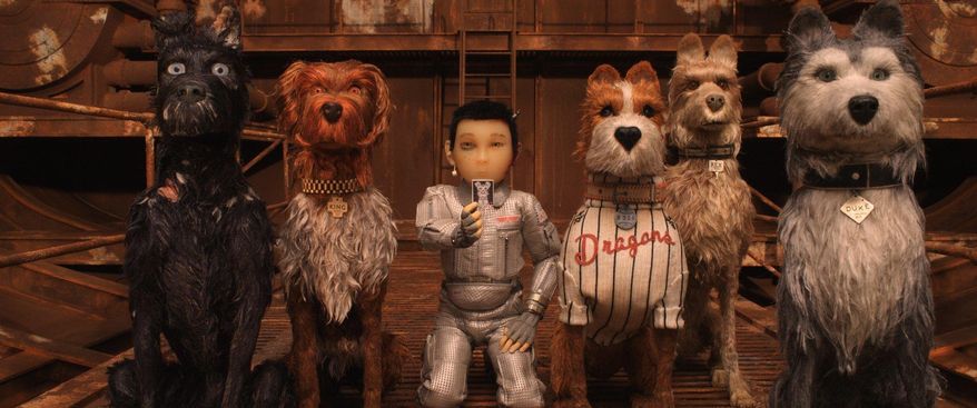 This image released by Fox Searchlight Pictures shows characters, from left, Chief, voiced by Bryan Cranston, King, voiced by Bob Balaban, Atari Kobayashi, voiced Koyu Rankin, Boss, voiced by Bill Murray, Rex, voiced by Edward Norton, And Duke, voiced by Jeff Goldblum, in a scene from "Isle of Dogs." (Fox Searchlight via AP)Koyu Rankin