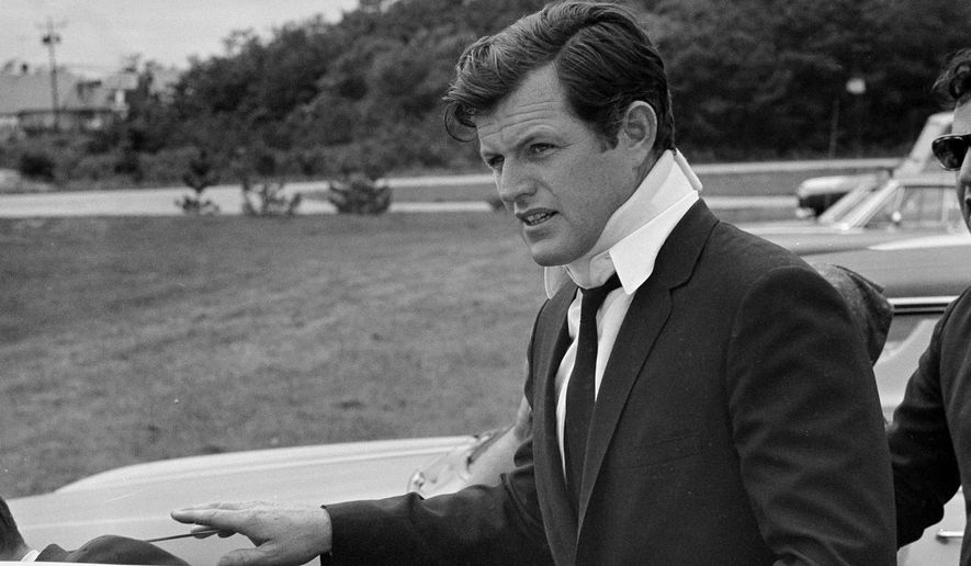 This July 22, 1969, photo shows U.S. Sen Edward Kennedy, D-Mass., arriving back at his home in Hyannis Port, Mass., after attending the funeral of Mary Jo Kopechne in Pennsylvania. A new feature film is in the works about the tragedy on the small Massachusetts island nearly a half century ago that rocked the Kennedy political dynasty. Kopechne drowned when a car driven by Kennedy went off a bridge on Chappaquiddick, a small island in Edgartown, Mass., on the eastern end of Martha&#x27;s Vineyard in July 1969. (AP Photo/Frank C. Curtin, File)