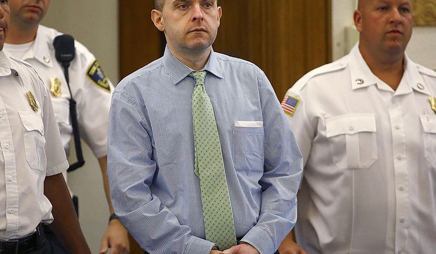 FILE - In this July 21, 2015 photo, officers lead Radoslaw Czerkawski into court for sentencing in Dedham, Mass., after he was convicted of larceny. Closing arguments are scheduled to begin Thursday, March 22, 2018, in the trial of Czerkawski, a Massachusetts man accused of abusing a dog so severely that it had to be euthanized. (Greg Derr/The Quincy Patriot Ledger via AP, File)
