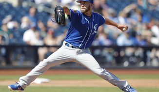 FILE - In this March 2, 2018, file photo, Kansas City Royals starting pitcher Danny Duffy throws during the second inning of a spring training baseball game against the San Diego Padres, in Peoria, Ariz. The Royals open the season at home against the Chicago White Sox, and left-hander Danny Duffy will be on the mound. (AP Photo/Charlie Neibergall, File)
