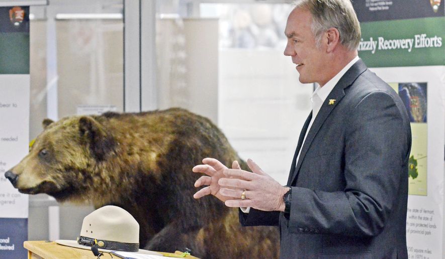 U.S. Secretary of the Interior Ryan Zinke speaks in support of the re-introduction of the grizzly bear to the North Cascades in Washington during a news conference Friday, March 23, 2018. Zinke made his announcement at the North Cascades National Park Service Complex Headquarters in Sedro-Woolley, Wash., to a group of local officials and the media. (Scott Terrell /Skagit Valley Herald via AP)