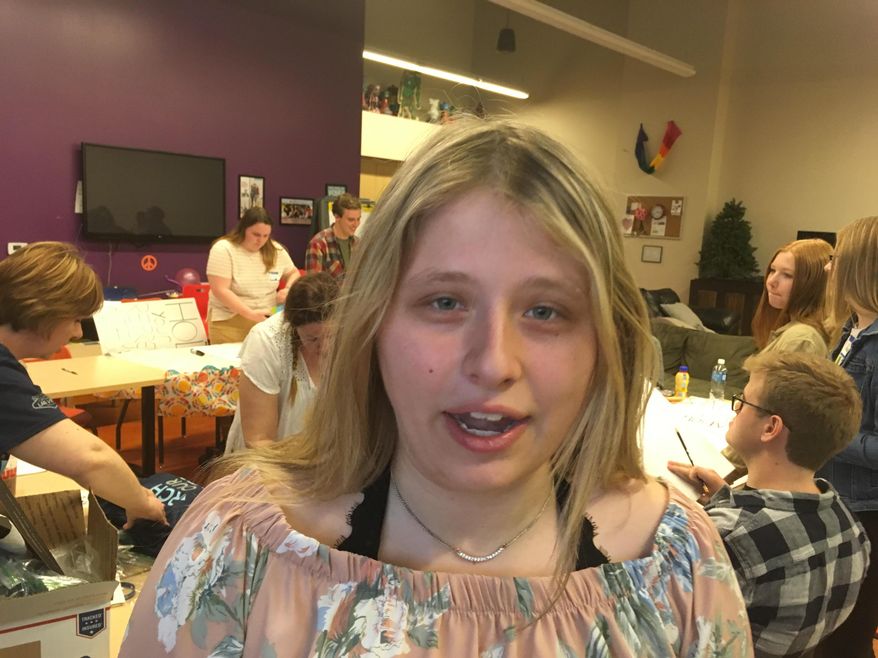 In this Wednesday, March 21, 2018, photo, Kaitlynn Willoughby, a senior at Clark High School in Las Vegas, talks ahead of a planned Saturday rally in Las Vegas echoing ones being held in other cities to call for gun control. Las Vegas high school student Willoughby says it seems like the massacre that killed her friend last year became just another shooting. That is until Florida students turned their own mass shooting last month into a rallying cry. (AP Photo/Ken Ritter)