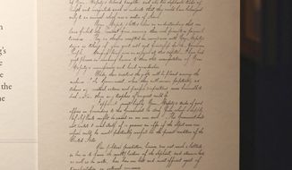 In this March 22, 2018, photo, a letter written by U.S. President Abraham Lincoln in 1862 replying to Thailand&#39;s King Mongkut is on display at the exhibition &amp;quot;Great and Good Friends,&amp;quot; inside Grand Palace Bangkok, Thailand.  Lincoln, likely bemused and relieved at the distraction from America’s then-raging Civil War, politely declined Mongut’s offer to send a pair of elephants as a gift to the United States, saying his country uses the steam engine and would have no use for the working animals. (AP Photo/Sakchai Lalit)