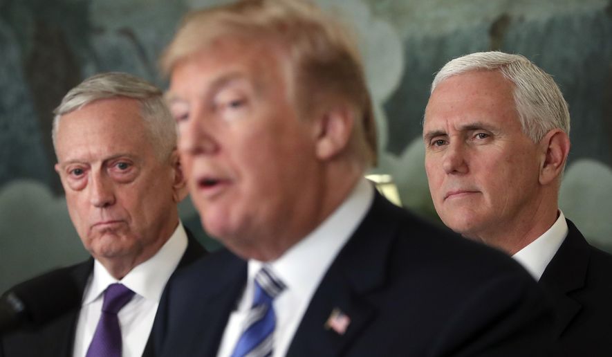 Defense Secretary Jim Mattis, left, and Vice President Mike Pence, right, listen to President Donald Trump, center, speaks in the Diplomatic Room of the White House in Washington, Friday, March 23, 2018, about the $1.3 trillion spending bill. (AP Photo/Pablo Martinez Monsivais) **FILE**