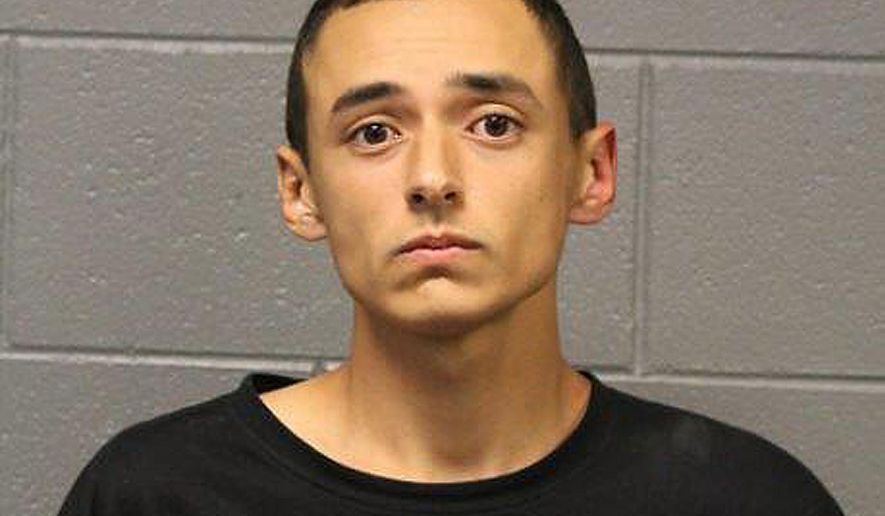 This photo provided by the Chicago Police Department shows Isaiah Malailua. Chicago police say Malailua was arrested Friday, March 23, 2018, by Amtrak at a Union Station ticket counter and charged with unlawful use of a weapon for wearing body armor. (Chicago Police Department via AP)