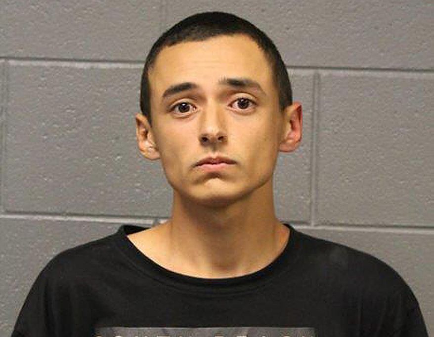 This photo provided by the Chicago Police Department shows Isaiah Malailua. Chicago police say Malailua was arrested Friday, March 23, 2018, by Amtrak at a Union Station ticket counter and charged with unlawful use of a weapon for wearing body armor. (Chicago Police Department via AP)