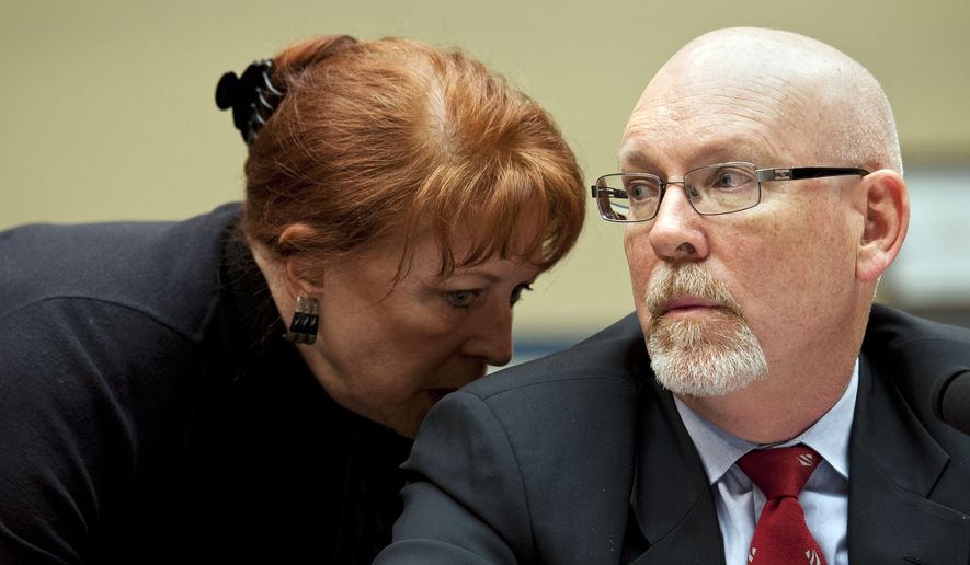 Gregory Hicks, former Deputy Chief of Mission in Libya, right, confers with his attorney Victoria Toensing as he testifies before the House Oversight and Government Reform Committee&#39;s hearing on Benghazi: Exposing Failure and Recognizing Courage on Capitol Hill in Washington, Wednesday, May 8, 2013. (AP Photo/Cliff Owen)