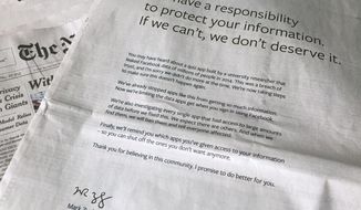 An advertisement in The New York Times is displayed on Sunday, March 25, 2018, in New York. Facebook’s CEO apologized for the Cambridge Analytica scandal with ads in multiple U.S. and British newspapers Sunday. The ads signed by Mark Zuckerberg say the social media platform doesn’t deserve to hold personal information if it can’t protect it. (AP Photo/Jenny Kane)