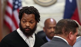 Philadelphia Eagles defensive end Michael Bennett appears in Harris County Civil Court in Houston on Monday, March 26, 2018. Bennett has surrendered to authorities in Houston on a charge that he injured a paraplegic woman as he tried to get onto the field after last year&#39;s Super Bowl to celebrate with his brother. (Godofredo A. Vasquez/Houston Chronicle via AP)