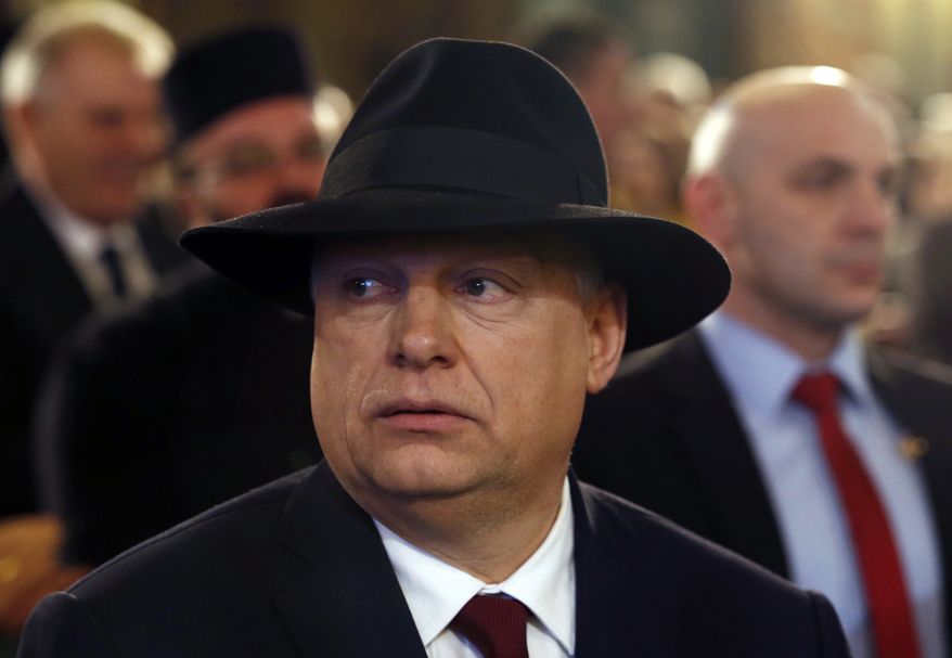 Hungary&#39;s Prime Minister Viktor Orban looks on during his visit to the ceremony marking the opening of a renovated synagogue in Subotica, Serbia, Monday, March 26, 2018. The renovation work on the synagogue, which was built in 1902, was financed jointly by both Serbia and Hungary in a sign of support for Serbia&#39;s depleted Jewish community. (AP Photo/Darko Vojinovic)