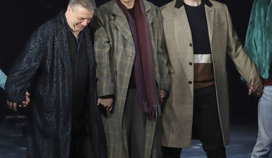 Nathan Lane, from left, Andrew Garfield and James McArdle participate in the curtain call for the "Angels in America" Broadway revival opening night at the Neil Simon Theatre on Sunday, March 25, 2018, in New York. (Photo by Greg Allen/Invision/AP)