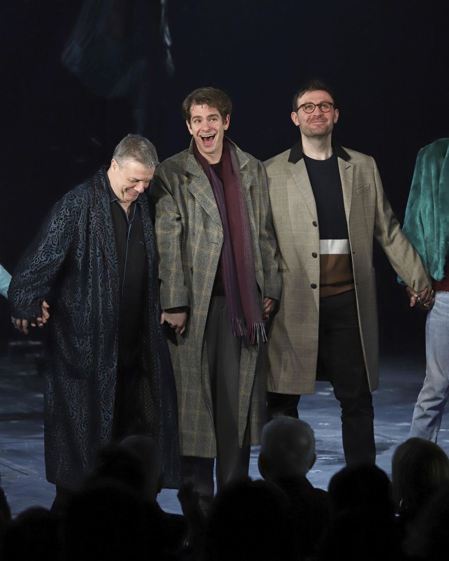 Nathan Lane, from left, Andrew Garfield and James McArdle participate in the curtain call for the "Angels in America" Broadway revival opening night at the Neil Simon Theatre on Sunday, March 25, 2018, in New York. (Photo by Greg Allen/Invision/AP)