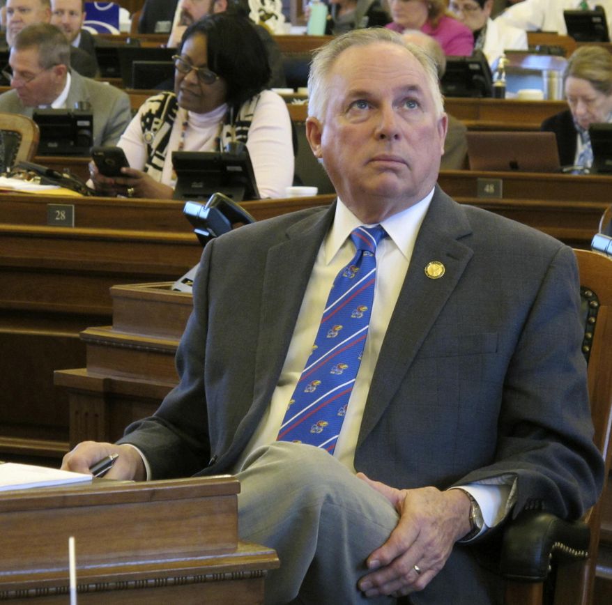 Kansas House Majority Leader Don Hineman, R-Dighton, watches one of the House's electronic tally boards as members approve a bill to narrow a law prohibiting state contractors from boycotting Israel, Monday, March 26, 2018, at the Statehouse in Topeka, Kan. The bill is designed to salvage the law after a federal judge blocked its enforcement (AP Photo/John Hanna)