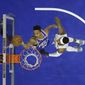 Philadelphia 76ers&#x27; Markelle Fultz, left, goes up for a shot past Denver Nuggets&#x27; Torrey Craig during the first half of an NBA basketball game, Monday, March 26, 2018, in Philadelphia. (AP Photo/Matt Slocum)