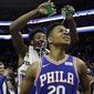 Philadelphia 76ers&#x27; Markelle Fultz, right, has water poured on him by Robert Covington after an NBA basketball game against the Denver Nuggets, Monday, March 26, 2018, in Philadelphia. Philadelphia won 123-104. (AP Photo/Matt Slocum)