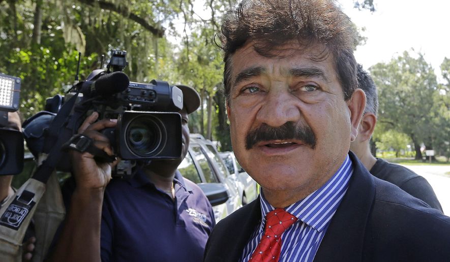 FILE- In this June 15, 2016 file photo Seddique Mir Mateen, father of Omar Mateen, the shooter of the Pulse nightclub massacre, talks to reporters in Fort Pierce, Fla. Lawyers for Noor Salman, the widow of the Pulse nightclub shooter, say they&#39;ve only just been told that the attacker&#39;s father was an FBI informant for 11 years. The attorneys are seeking a mistrial in her case. (AP Photo/Alan Diaz, File)