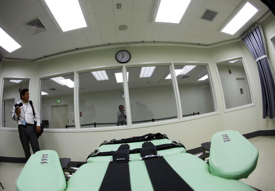 FILE - This Sept. 21, 2010 file photo shows the interior of the lethal injection facility at San Quentin State Prison in San Quentin, Calif. The battle over California's voter-backed effort to resume executions is beginning in earnest, with state officials and death penalty supporters moving to end court orders that have blocked executions since 2006. State officials and a former NFL player whose family was murdered are asking a Marin County judge on March 28, 2018, to lift his injunction, arguing that California now has the necessary regulations switching to a single lethal dose of powerful barbiturates to execute condemned inmates. (AP Photo/Eric Risberg, File)