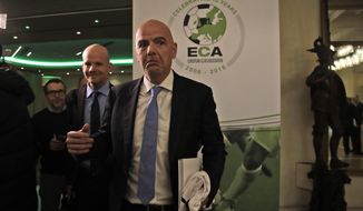 FIFA president Gianni Infantino leaves at the end of European Club Association&#39;s (ECA) 20th General Assembly, in the organization&#39;s 10-year anniversary in Rome, Tuesday, March 27, 2018. (AP Photo/Alessandra Tarantino)