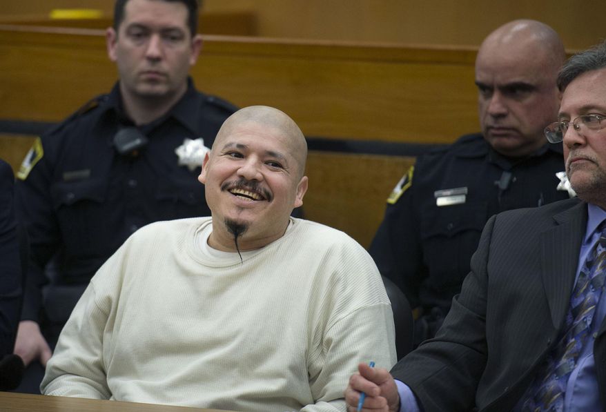 Luis Bracamontes smiles as the verdict is read that he will receive the death penalty in the murders of Sacramento Sheriff's Deputy Danny Oliver and Placer County Det. Michael Davis Jr., Tuesday, March 27, 2018, in Sacramento, Calif. (Randy Pench/The Sacramento Bee via AP)