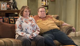 FILE - In this image released by ABC, Roseanne Barr, left, and John Goodman appear in a scene from the reboot of &amp;quot;Roseanne,&amp;quot; premiering on Tuesday at 8 p.m. EST. For the reboot, Roseanne will be at odds with her sister Jackie, played by Laurie Metcalf, over President Donald Trump. Barr said she thought it was important to show how the Conner family deals with the same issues many American families are facing. (Adam Rose/ABC via AP, File)